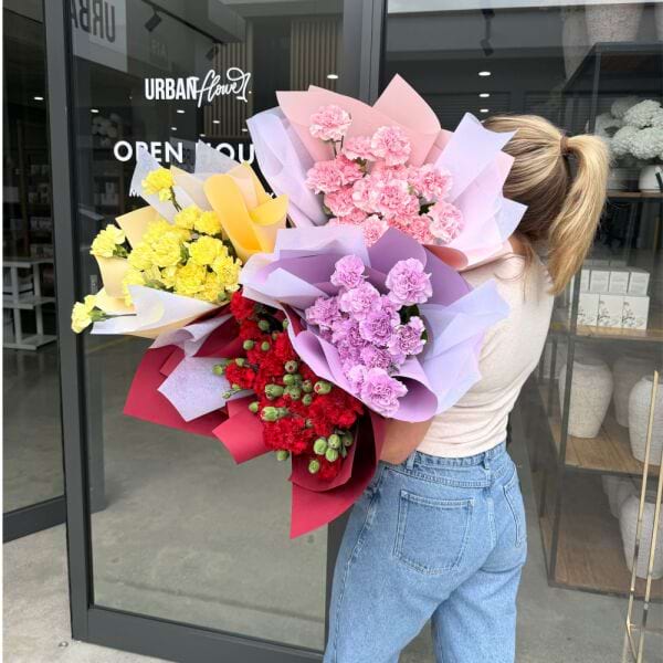 Lou holding all carnations